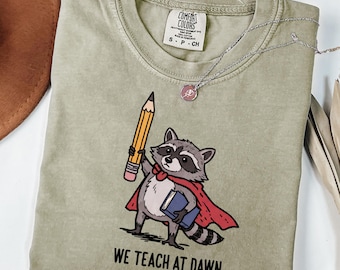 Comfort Colors® Teacher Shirt Funny Raccoon We Teach At Dawn Kindergarten Teacher Tee First Grade Back to School T-Shirt Educator Gift